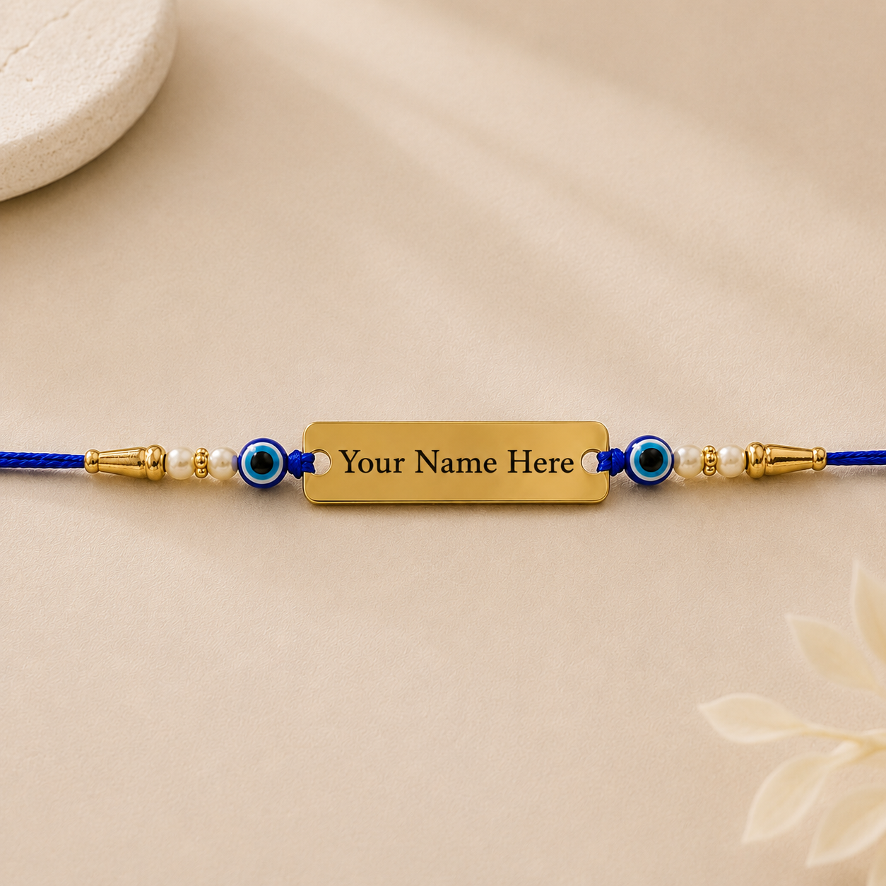 Custom name rakhi – gold plate engraved with your brother's name