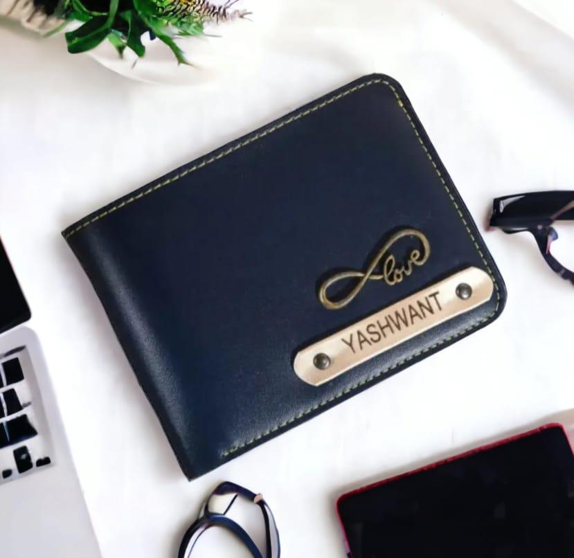 Customized men's faux leather wallet with name plate and gold love charm on white background