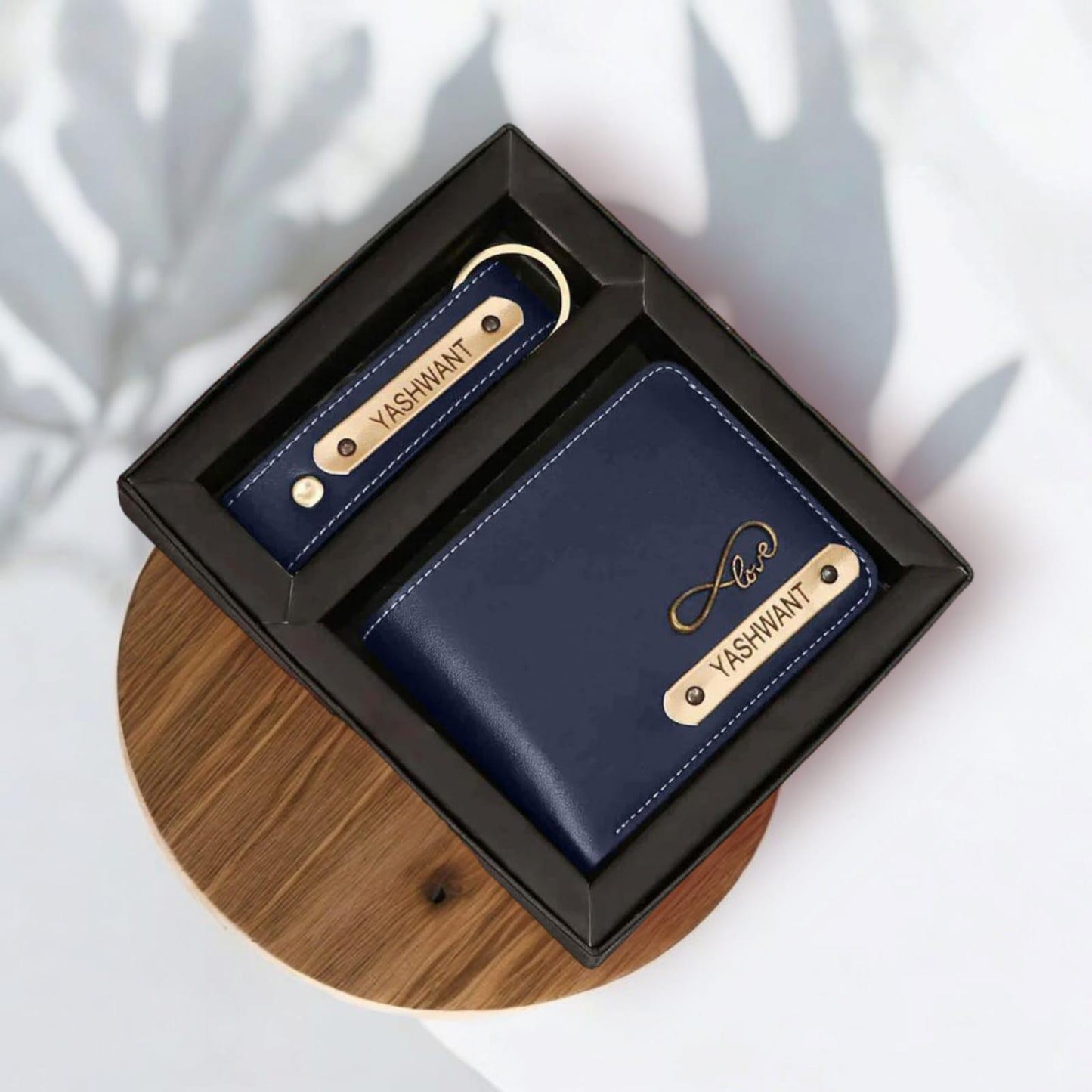 Personalized navy blue men's wallet and keychain gift set with custom nameplate in box