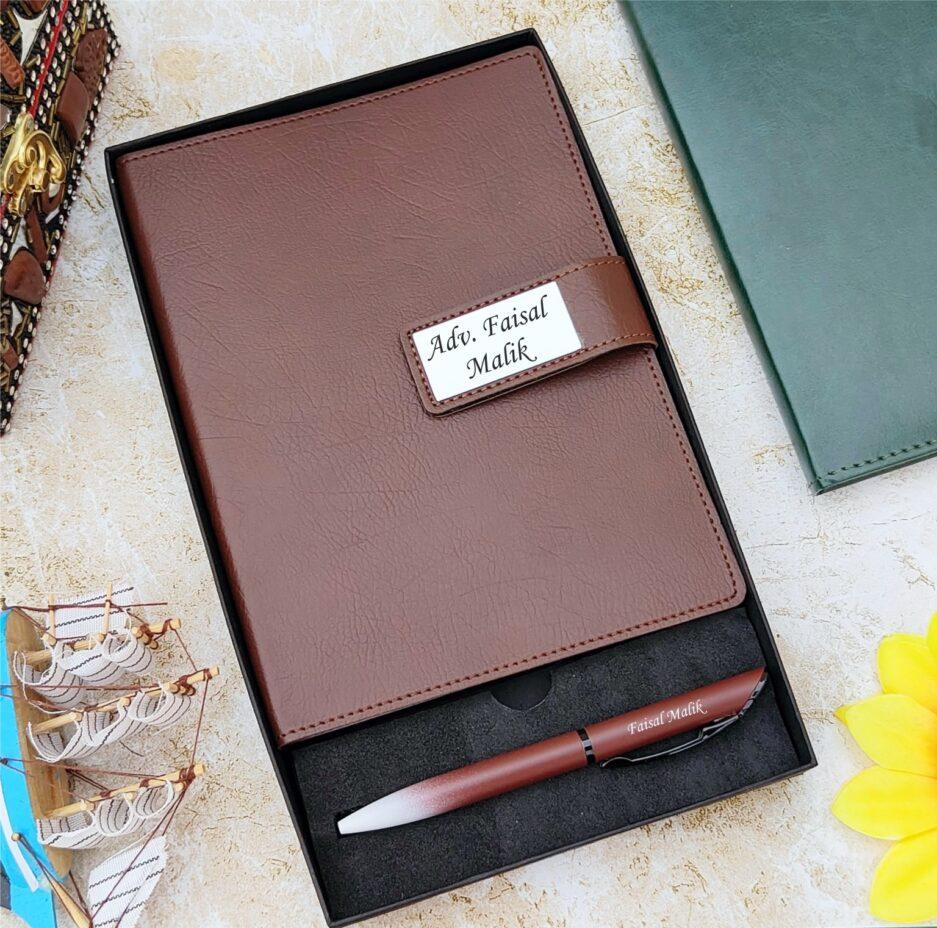 Personalized brown leather diary and engraved pen gift set in a presentation box